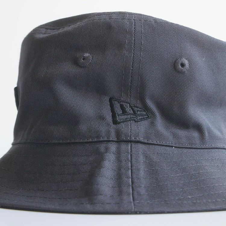 NEWERA® REVERSIBLE BUCKET HAT